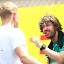 MONTE-CARLO, MONACO - MAY 29: Sebastian Vettel of Germany and Aston Martin F1 Team and Mick Schumacher of Germany and Haas F1 talk on the drivers parade ahead of the F1 Grand Prix of Monaco at Circuit de Monaco on May 29, 2022 in Monte-Carlo, Monaco. (Photo by Joe Portlock - Formula 1/Formula 1 via Getty Images)