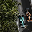 MONTE-CARLO, MONACO - MAY 29: Sebastian Vettel of Germany driving the (5) Aston Martin AMR22 Mercedes and Daniel Ricciardo of Australia driving the (3) McLaren MCL36 Mercedes battle for track position during the F1 Grand Prix of Monaco at Circuit de Monaco on May 29, 2022 in Monte-Carlo, Monaco. (Photo by Clive Mason - Formula 1/Formula 1 via Getty Images)
