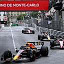 MONTE-CARLO, MONACO - MAY 29: Sergio Perez of Mexico driving the (11) Oracle Red Bull Racing RB18 leads Carlos Sainz of Spain driving (55) the Ferrari F1-75, Max Verstappen of the Netherlands driving the (1) Oracle Red Bull Racing RB18 and Charles Leclerc of Monaco driving the (16) Ferrari F1-75 during the F1 Grand Prix of Monaco at Circuit de Monaco on May 29, 2022 in Monte-Carlo, Monaco. (Photo by Clive Mason - Formula 1/Formula 1 via Getty Images)