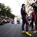MONTE-CARLO, MONACO - MAY 29: Race winner Sergio Perez of Mexico and Oracle Red Bull Racing and Third placed Max Verstappen of the Netherlands and Oracle Red Bull Racing talk in parc ferme during the F1 Grand Prix of Monaco at Circuit de Monaco on May 29, 2022 in Monte-Carlo, Monaco. (Photo by Dan Istitene - Formula 1/Formula 1 via Getty Images)