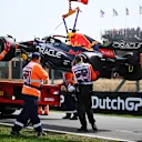 ZANDVOORT, NETHERLANDS - SEPTEMBER 02: The car of Max Verstappen of the Netherlands and Oracle Red Bull Racing is removed from the track during practice ahead of the F1 Grand Prix of The Netherlands at Circuit Zandvoort on September 02, 2022 in Zandvoort, Netherlands. (Photo by Clive Mason/Getty Images)