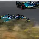 ZANDVOORT, NETHERLANDS - SEPTEMBER 03: Sebastian Vettel of Germany driving the (5) Aston Martin AMR22 Mercedes and Lance Stroll of Canada driving the (18) Aston Martin AMR22 Mercedes on track during final practice ahead of the F1 Grand Prix of The Netherlands at Circuit Zandvoort on September 03, 2022 in Zandvoort, Netherlands. (Photo by Clive Mason/Getty Images)