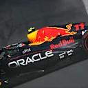 ZANDVOORT, NETHERLANDS - SEPTEMBER 03: Sergio Perez of Mexico driving the (11) Oracle Red Bull Racing RB18 spins during qualifying ahead of the F1 Grand Prix of The Netherlands at Circuit Zandvoort on September 03, 2022 in Zandvoort, Netherlands. (Photo by Joe Portlock - Formula 1/Formula 1 via Getty Images)