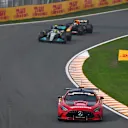 ZANDVOORT, NETHERLANDS - SEPTEMBER 04: The FIA safety car leads Lewis Hamilton of Great Britain driving the (44) Mercedes AMG Petronas F1 Team W13 and Max Verstappen of the Netherlands driving the (1) Oracle Red Bull Racing RB18 during the F1 Grand Prix of The Netherlands at Circuit Zandvoort on September 04, 2022 in Zandvoort, Netherlands. (Photo by Clive Mason/Getty Images)