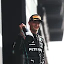 ZANDVOORT, NETHERLANDS - SEPTEMBER 04: Second placed George Russell of Great Britain and Mercedes celebrates on the podium during the F1 Grand Prix of The Netherlands at Circuit Zandvoort on September 04, 2022 in Zandvoort, Netherlands. (Photo by Lars Baron - Formula 1/Formula 1 via Getty Images)