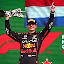 ZANDVOORT, NETHERLANDS - SEPTEMBER 04: Race winner Max Verstappen of the Netherlands and Oracle Red Bull Racing celebrates on the podium during the F1 Grand Prix of The Netherlands at Circuit Zandvoort on September 04, 2022 in Zandvoort, Netherlands. (Photo by Joe Portlock - Formula 1/Formula 1 via Getty Images)