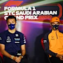 JEDDAH, SAUDI ARABIA - MARCH 25: Alexander Albon of Thailand and Williams and Lando Norris of Great Britain and McLaren attend the Drivers Press Conference before practice ahead of the F1 Grand Prix of Saudi Arabia at the Jeddah Corniche Circuit on March 25, 2022 in Jeddah, Saudi Arabia. (Photo by Clive Mason/Getty Images)