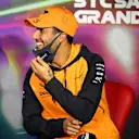 JEDDAH, SAUDI ARABIA - MARCH 25: Daniel Ricciardo of Australia and McLaren looks on in the Drivers Press Conference before practice ahead of the F1 Grand Prix of Saudi Arabia at the Jeddah Corniche Circuit on March 25, 2022 in Jeddah, Saudi Arabia. (Photo by Clive Mason/Getty Images)