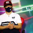 JEDDAH, SAUDI ARABIA - MARCH 25: Yuki Tsunoda of Japan and Scuderia AlphaTauri talks in the Drivers Press Conference before practice ahead of the F1 Grand Prix of Saudi Arabia at the Jeddah Corniche Circuit on March 25, 2022 in Jeddah, Saudi Arabia. (Photo by Dan Istitene - Formula 1/Formula 1 via Getty Images)