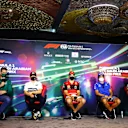 JEDDAH, SAUDI ARABIA - MARCH 25: (L-R) Nico Hulkenberg of Germany and Aston Martin F1 Team, Yuki Tsunoda of Japan and Scuderia AlphaTauri, Charles Leclerc of Monaco and Ferrari, Fernando Alonso of Spain and Alpine F1 and Sergio Perez of Mexico and Oracle Red Bull Racing attend the Drivers Press Conference before practice ahead of the F1 Grand Prix of Saudi Arabia at the Jeddah Corniche Circuit on March 25, 2022 in Jeddah, Saudi Arabia. (Photo by Dan Istitene - Formula 1/Formula 1 via Getty Images)