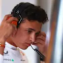 JEDDAH, SAUDI ARABIA - MARCH 25: Lando Norris of Great Britain and McLaren looks on in the garage during practice ahead of the F1 Grand Prix of Saudi Arabia at the Jeddah Corniche Circuit on March 25, 2022 in Jeddah, Saudi Arabia. (Photo by Lars Baron/Getty Images)