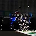 JEDDAH, SAUDI ARABIA - MARCH 25: Sparks fly behind Alexander Albon of Thailand driving the (23) Williams FW44 Mercedes on track during practice ahead of the F1 Grand Prix of Saudi Arabia at the Jeddah Corniche Circuit on March 25, 2022 in Jeddah, Saudi Arabia. (Photo by Clive Mason/Getty Images)