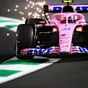 JEDDAH, SAUDI ARABIA - MARCH 26: Sparks fly behind Esteban Ocon of France driving the (31) Alpine F1 A522 Renault during qualifying ahead of the F1 Grand Prix of Saudi Arabia at the Jeddah Corniche Circuit on March 26, 2022 in Jeddah, Saudi Arabia. (Photo by Dan Istitene - Formula 1/Formula 1 via Getty Images)