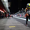 JEDDAH, SAUDI ARABIA - MARCH 26: Lando Norris of Great Britain and McLaren walks in the Pitlane after qualifying in 11th position during qualifying ahead of the F1 Grand Prix of Saudi Arabia at the Jeddah Corniche Circuit on March 26, 2022 in Jeddah, Saudi Arabia. (Photo by Mark Thompson/Getty Images)