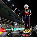 JEDDAH, SAUDI ARABIA - MARCH 26: Pole position qualifier Sergio Perez of Mexico and Oracle Red Bull Racing celebrates in parc ferme during qualifying ahead of the F1 Grand Prix of Saudi Arabia at the Jeddah Corniche Circuit on March 26, 2022 in Jeddah, Saudi Arabia. (Photo by Mark Thompson/Getty Images)