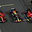 JEDDAH, SAUDI ARABIA - MARCH 26: Pole position qualifier Sergio Perez of Mexico and Oracle Red Bull Racing, Second placed qualifier Charles Leclerc of Monaco and Ferrari and Third placed qualifier Carlos Sainz of Spain and Ferrari stop in parc ferme during qualifying ahead of the F1 Grand Prix of Saudi Arabia at the Jeddah Corniche Circuit on March 26, 2022 in Jeddah, Saudi Arabia. (Photo by Clive Rose - Formula 1/Formula 1 via Getty Images)