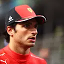 JEDDAH, SAUDI ARABIA - MARCH 26: Third placed qualifier Carlos Sainz of Spain and Ferrari walks in parc ferme during qualifying ahead of the F1 Grand Prix of Saudi Arabia at the Jeddah Corniche Circuit on March 26, 2022 in Jeddah, Saudi Arabia. (Photo by Dan Istitene - Formula 1/Formula 1 via Getty Images)