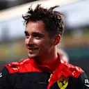JEDDAH, SAUDI ARABIA - MARCH 26: Second placed qualifier Charles Leclerc of Monaco and Ferrari smiles in parc ferme during qualifying ahead of the F1 Grand Prix of Saudi Arabia at the Jeddah Corniche Circuit on March 26, 2022 in Jeddah, Saudi Arabia. (Photo by Dan Istitene - Formula 1/Formula 1 via Getty Images)