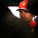 JEDDAH, SAUDI ARABIA - MARCH 26: Third placed qualifier Carlos Sainz of Spain and Ferrari talks to the media in the Paddock after qualifying ahead of the F1 Grand Prix of Saudi Arabia at the Jeddah Corniche Circuit on March 26, 2022 in Jeddah, Saudi Arabia. (Photo by Lars Baron/Getty Images)