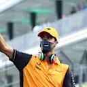 JEDDAH, SAUDI ARABIA - MARCH 27: Daniel Ricciardo of Australia and McLaren waves to the crowd on the drivers parade ahead of the F1 Grand Prix of Saudi Arabia at the Jeddah Corniche Circuit on March 27, 2022 in Jeddah, Saudi Arabia. (Photo by Lars Baron/Getty Images)