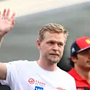 JEDDAH, SAUDI ARABIA - MARCH 27: Kevin Magnussen of Denmark and Haas F1 waves to the crowd from the drivers parade ahead of the F1 Grand Prix of Saudi Arabia at the Jeddah Corniche Circuit on March 27, 2022 in Jeddah, Saudi Arabia. (Photo by Dan Istitene - Formula 1/Formula 1 via Getty Images)