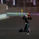 JEDDAH, SAUDI ARABIA - MARCH 27: Nicholas Latifi of Canada and Williams runs across the track after crashing during the F1 Grand Prix of Saudi Arabia at the Jeddah Corniche Circuit on March 27, 2022 in Jeddah, Saudi Arabia. (Photo by Joe Portlock - Formula 1/Formula 1 via Getty Images)