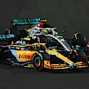 JEDDAH, SAUDI ARABIA - MARCH 27: Lando Norris of Great Britain driving the (4) McLaren MCL36 Mercedes leads Lewis Hamilton of Great Britain driving the (44) Mercedes AMG Petronas F1 Team W13  during the F1 Grand Prix of Saudi Arabia at the Jeddah Corniche Circuit on March 27, 2022 in Jeddah, Saudi Arabia. (Photo by Lars Baron/Getty Images)