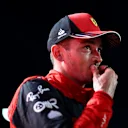 JEDDAH, SAUDI ARABIA - MARCH 27: Second placed Charles Leclerc of Monaco and Ferrari looks on in parc ferme during the F1 Grand Prix of Saudi Arabia at the Jeddah Corniche Circuit on March 27, 2022 in Jeddah, Saudi Arabia. (Photo by Dan Istitene - Formula 1/Formula 1 via Getty Images)