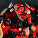 JEDDAH, SAUDI ARABIA - MARCH 27: Second placed Charles Leclerc of Monaco and Ferrari celebrates with his team in parc ferme during the F1 Grand Prix of Saudi Arabia at the Jeddah Corniche Circuit on March 27, 2022 in Jeddah, Saudi Arabia. (Photo by Clive Rose - Formula 1/Formula 1 via Getty Images)