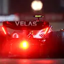 SINGAPORE, SINGAPORE - OCTOBER 01: Carlos Sainz of Spain driving (55) the Ferrari F1-75 on track during qualifying ahead of the F1 Grand Prix of Singapore at Marina Bay Street Circuit on October 01, 2022 in Singapore, Singapore. (Photo by Bryn Lennon - Formula 1/Formula 1 via Getty Images)