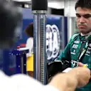 SINGAPORE, SINGAPORE - OCTOBER 01: Twelfth placed qualifier Lance Stroll of Canada and Aston Martin F1 Team is weighed in the FIA garage during qualifying ahead of the F1 Grand Prix of Singapore at Marina Bay Street Circuit on October 01, 2022 in Singapore, Singapore. (Photo by Dan Istitene - Formula 1/Formula 1 via Getty Images)