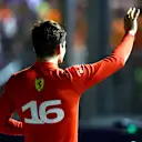 SINGAPORE, SINGAPORE - OCTOBER 01: Pole position qualifier Charles Leclerc of Monaco and Ferrari celebrates in parc ferme during qualifying ahead of the F1 Grand Prix of Singapore at Marina Bay Street Circuit on October 01, 2022 in Singapore, Singapore. (Photo by Mark Thompson/Getty Images,)