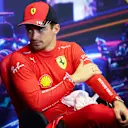 SINGAPORE, SINGAPORE - OCTOBER 01: Pole position qualifier Charles Leclerc of Monaco and Ferrari attends the press conference after qualifying ahead of the F1 Grand Prix of Singapore at Marina Bay Street Circuit on October 01, 2022 in Singapore, Singapore. (Photo by Dan Istitene/Getty Images)
