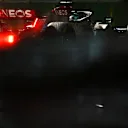 SINGAPORE, SINGAPORE - OCTOBER 02: George Russell of Great Britain driving the (63) Mercedes AMG Petronas F1 Team W13 on his way to the grid prior to the F1 Grand Prix of Singapore at Marina Bay Street Circuit on October 02, 2022 in Singapore, Singapore. (Photo by Clive Mason/Getty Images,)