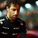 SINGAPORE, SINGAPORE - OCTOBER 02: Daniel Ricciardo of Australia and McLaren looks on from the grid during the F1 Grand Prix of Singapore at Marina Bay Street Circuit on October 02, 2022 in Singapore, Singapore. (Photo by Dan Istitene - Formula 1/Formula 1 via Getty Images)