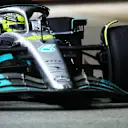 SINGAPORE, SINGAPORE - OCTOBER 02: Lewis Hamilton of Great Britain driving the (44) Mercedes AMG Petronas F1 Team W13 with a broken front wing during the F1 Grand Prix of Singapore at Marina Bay Street Circuit on October 02, 2022 in Singapore, Singapore. (Photo by Mark Thompson/Getty Images,)