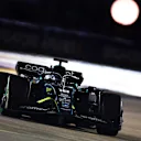 SINGAPORE, SINGAPORE - OCTOBER 02: Lance Stroll of Canada driving the (18) Aston Martin AMR22 Mercedes on track during the F1 Grand Prix of Singapore at Marina Bay Street Circuit on October 02, 2022 in Singapore, Singapore. (Photo by Clive Rose/Getty Images,)
