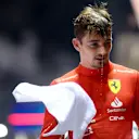 SINGAPORE, SINGAPORE - OCTOBER 02: Second placed Charles Leclerc of Monaco and Ferrari looks on in parc ferme during the F1 Grand Prix of Singapore at Marina Bay Street Circuit on October 02, 2022 in Singapore, Singapore. (Photo by Dan Istitene - Formula 1/Formula 1 via Getty Images)