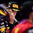 SINGAPORE, SINGAPORE - OCTOBER 02: Race winner Sergio Perez of Mexico and Oracle Red Bull Racing celebrates on the podium during the F1 Grand Prix of Singapore at Marina Bay Street Circuit on October 02, 2022 in Singapore, Singapore. (Photo by Mario Renzi - Formula 1/Formula 1 via Getty Images)