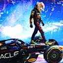 SINGAPORE, SINGAPORE - OCTOBER 02: Race winner Sergio Perez of Mexico and Oracle Red Bull Racing celebrates in parc ferme during the F1 Grand Prix of Singapore at Marina Bay Street Circuit on October 02, 2022 in Singapore, Singapore. (Photo by Clive Rose/Getty Images,)