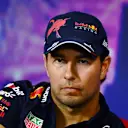 SINGAPORE, SINGAPORE - SEPTEMBER 29: Sergio Perez of Mexico and Oracle Red Bull Racing attends the Drivers Press Conference during previews ahead of the F1 Grand Prix of Singapore at Marina Bay Street Circuit on September 29, 2022 in Singapore, Singapore. (Photo by Clive Mason/Getty Images,)