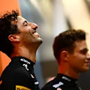SINGAPORE, SINGAPORE - SEPTEMBER 29: Daniel Ricciardo of Australia and McLaren and Lando Norris of Great Britain and McLaren look on in the Paddock during previews ahead of the F1 Grand Prix of Singapore at Marina Bay Street Circuit on September 29, 2022 in Singapore, Singapore. (Photo by Clive Mason/Getty Images,)