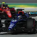 BARCELONA, SPAIN - MAY 20: Alexander Albon of Thailand driving the (23) Williams FW44 Mercedes leads Carlos Sainz of Spain driving (55) the Ferrari F1-75 during practice ahead of the F1 Grand Prix of Spain at Circuit de Barcelona-Catalunya on May 20, 2022 in Barcelona, Spain. (Photo by Bryn Lennon - Formula 1/Formula 1 via Getty Images)