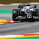 BARCELONA, SPAIN - MAY 21: Yuki Tsunoda of Japan driving the (22) Scuderia AlphaTauri AT03 on track during practice ahead of the F1 Grand Prix of Spain at Circuit de Barcelona-Catalunya on May 21, 2022 in Barcelona, Spain. (Photo by Mark Thompson/Getty Images)