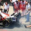 BARCELONA, SPAIN - MAY 21: The Haas F1 team put out a fire on the rear of the car of Mick Schumacher of Germany and Haas F1 in the Pitlane during practice ahead of the F1 Grand Prix of Spain at Circuit de Barcelona-Catalunya on May 21, 2022 in Barcelona, Spain. (Photo by Dan Istitene - Formula 1/Formula 1 via Getty Images)