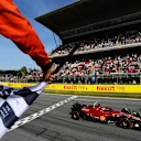 BARCELONA, SPAIN - MAY 21: Pole position qualifier Charles Leclerc of Monaco driving the (16) Ferrari F1-75 takes the chequered flag during qualifying ahead of the F1 Grand Prix of Spain at Circuit de Barcelona-Catalunya on May 21, 2022 in Barcelona, Spain. (Photo by Mario Renzi - Formula 1/Formula 1 via Getty Images)