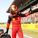 BARCELONA, SPAIN - MAY 21: Third placed qualifier Carlos Sainz of Spain and Ferrari waves to the crowd from parc ferme during qualifying ahead of the F1 Grand Prix of Spain at Circuit de Barcelona-Catalunya on May 21, 2022 in Barcelona, Spain. (Photo by Dan Istitene - Formula 1/Formula 1 via Getty Images)