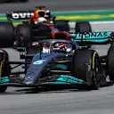 BARCELONA, SPAIN - MAY 22: George Russell of Great Britain driving the (63) Mercedes AMG Petronas F1 Team W13 leads Max Verstappen of the Netherlands driving the (1) Oracle Red Bull Racing RB18 during the F1 Grand Prix of Spain at Circuit de Barcelona-Catalunya on May 22, 2022 in Barcelona, Spain. (Photo by Mark Thompson/Getty Images)