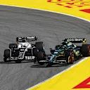 BARCELONA, SPAIN - MAY 22: Pierre Gasly of France driving the (10) Scuderia AlphaTauri AT03 and Lance Stroll of Canada driving the (18) Aston Martin AMR22 Mercedes battle for track position during the F1 Grand Prix of Spain at Circuit de Barcelona-Catalunya on May 22, 2022 in Barcelona, Spain. (Photo by Lars Baron/Getty Images)