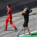 BARCELONA, SPAIN - MAY 22: Charles Leclerc of Monaco and Ferrari walks in the Pitlane after retiring from the race during the F1 Grand Prix of Spain at Circuit de Barcelona-Catalunya on May 22, 2022 in Barcelona, Spain. (Photo by Dan Istitene - Formula 1/Formula 1 via Getty Images)